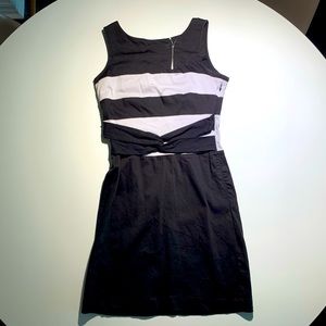 Black and pale taupe with front tie details and asymmetrical zipper detail